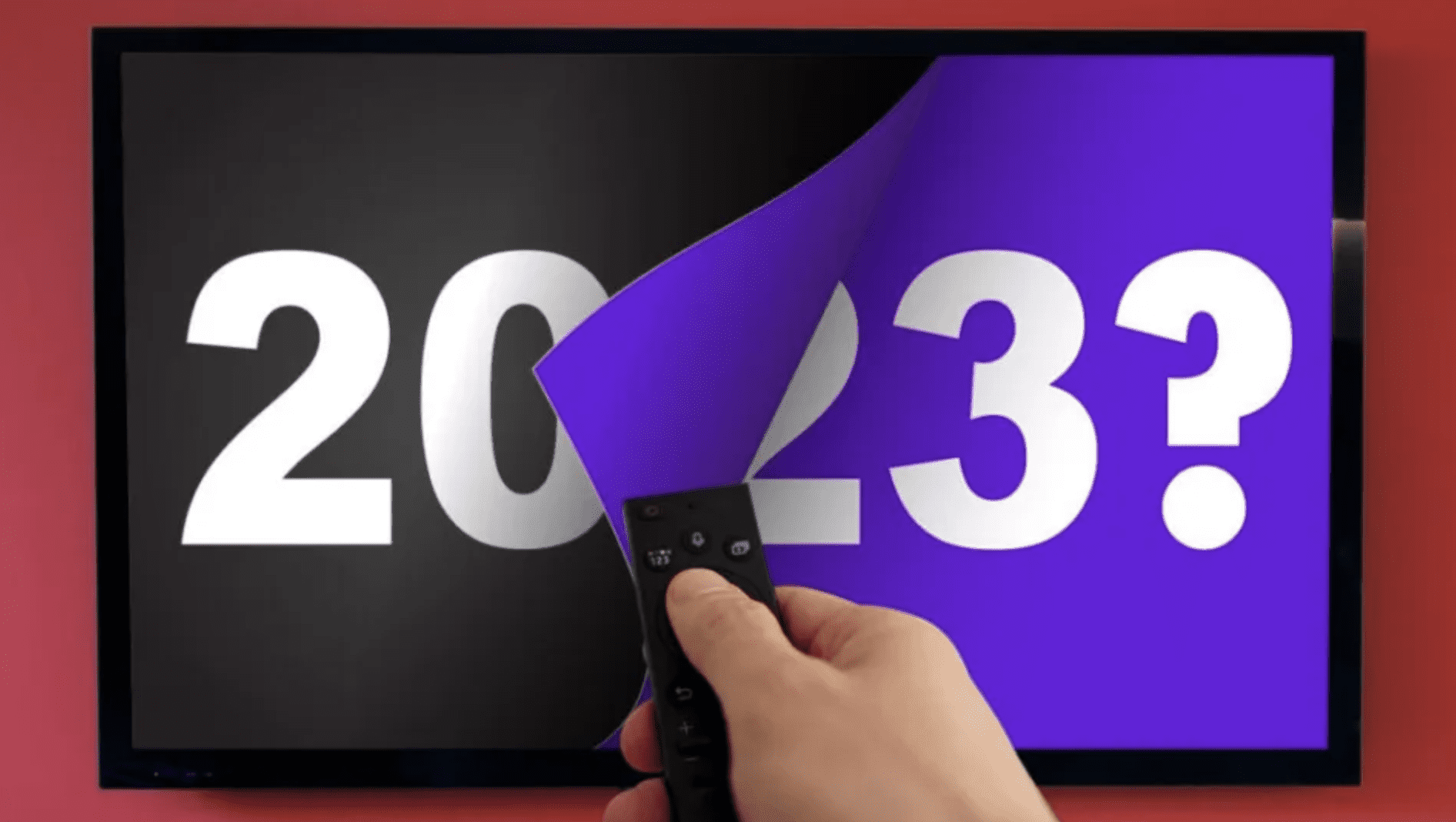 Switching TV screen from 2022 to 2023 with remote control, showcasing new year transition, modern digital display, and vibrant colors for festive celebration.