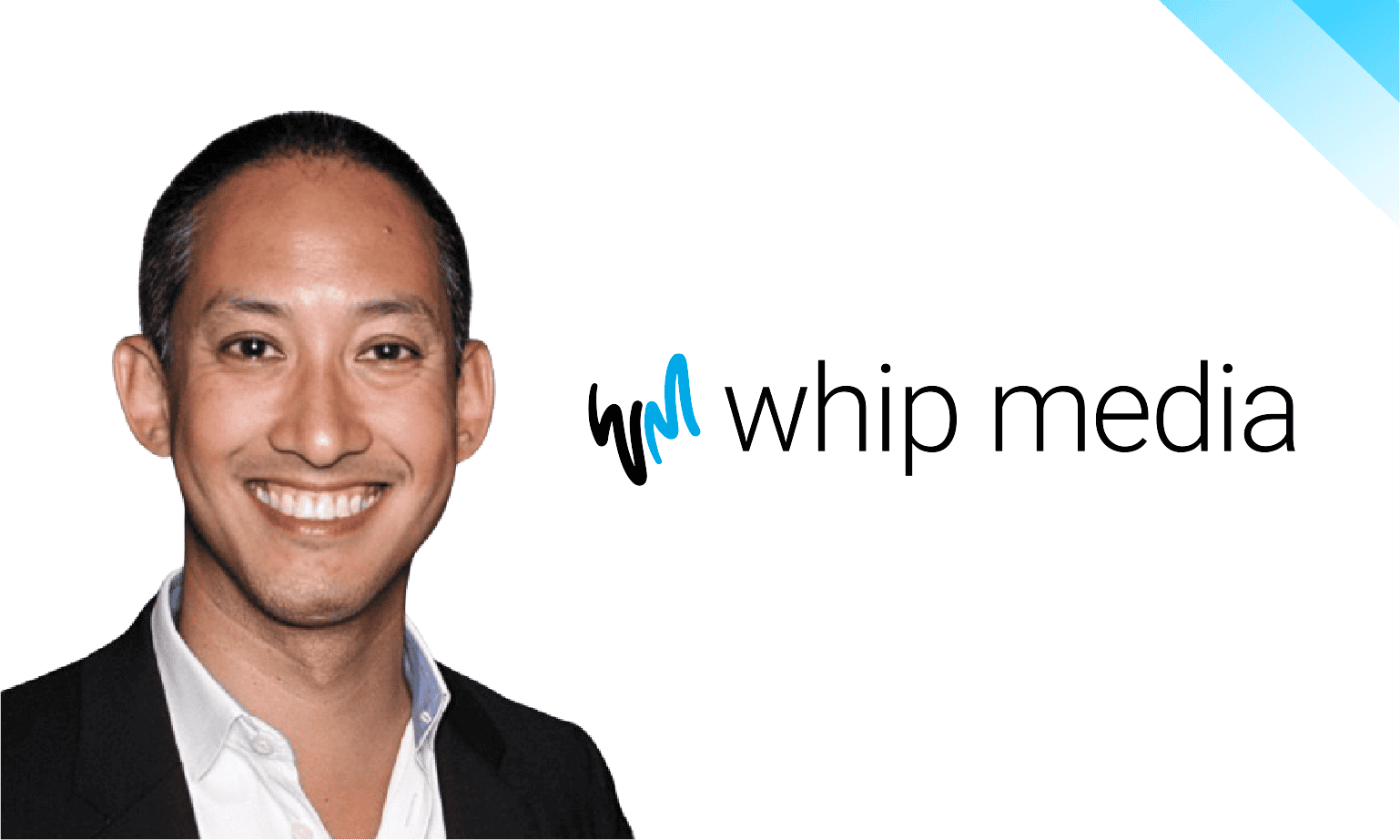 Smiling man in professional attire representing Whip Media, a leader in entertainment analytics and TV data solutions.
